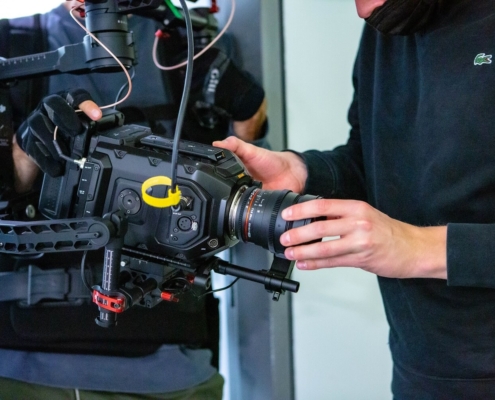 Camera crew Frankfurt when making settings.